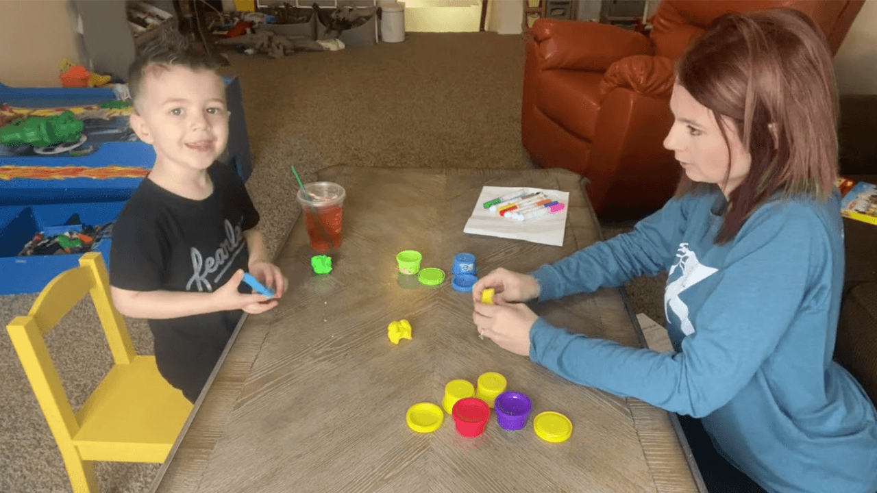 A woman and a child playing together
